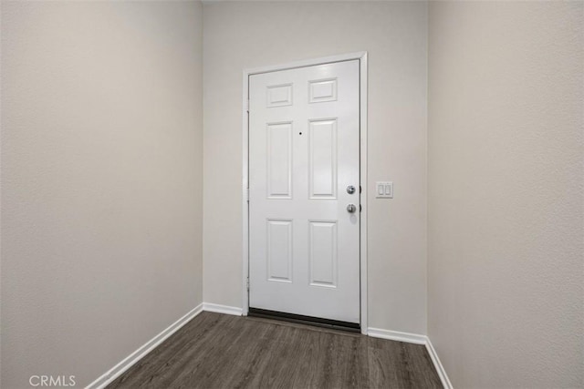 508 Bristolwood Rd, Hemet, CA 92543 - doorway to outside featuring dark wood-style floors and baseboards
