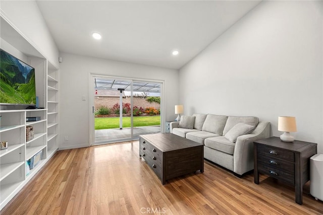 487 N Fern St, Orange, CA 92867 - living area with light wood-style flooring, vaulted ceiling, recessed lighting, and baseboards