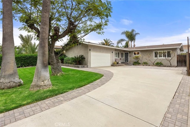 487 N Fern St, Orange, CA 92867 - single story home with stucco siding, driveway, and an attached garage