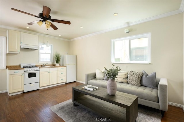 26 Covina Ave, Long Beach, CA 90803 - living area featuring ornamental molding, a ceiling fan, dark wood-style flooring, baseboards, and recessed lighting
