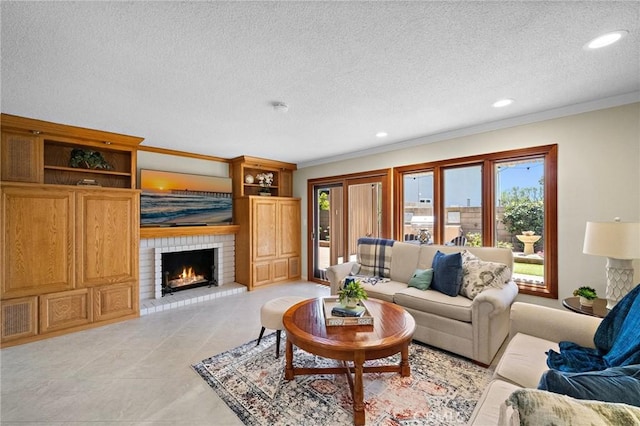 20161 Glacier Cir, Huntington Beach, CA 92646 - living room featuring a fireplace, healthy amount of natural light, ornamental molding, a textured ceiling, and recessed lighting