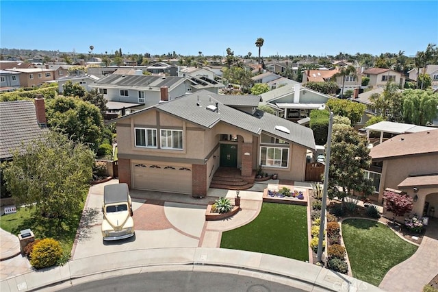 20161 Glacier Cir, Huntington Beach, CA 92646 - view of front of property featuring a residential view, driveway, an attached garage, and stucco siding