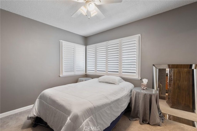 14017 S Wilkie Ave, Gardena, CA 90249 - carpeted bedroom featuring ceiling fan and a textured ceiling