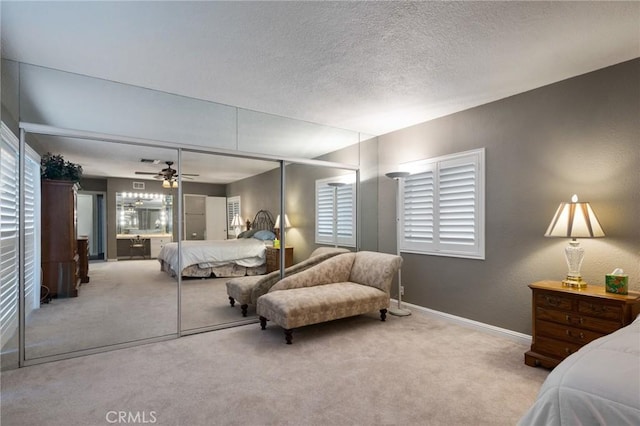 14017 S Wilkie Ave, Gardena, CA 90249 - carpeted bedroom featuring baseboards, a textured ceiling, ceiling fan, and a closet