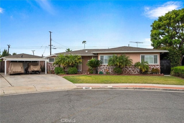 14017 S Wilkie Ave, Gardena, CA 90249 - ranch-style home with a front yard, concrete driveway, and a carport