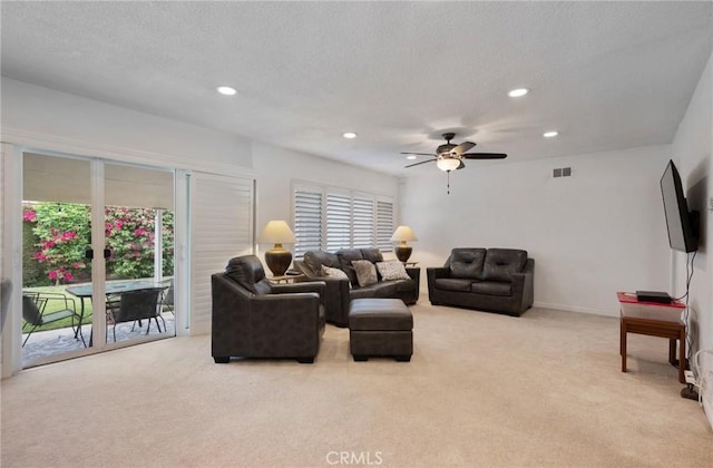 14017 S Wilkie Ave, Gardena, CA 90249 - carpeted living room with recessed lighting, a ceiling fan, baseboards, and a textured ceiling