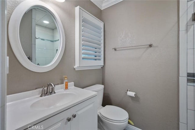 14017 S Wilkie Ave, Gardena, CA 90249 - full bath with toilet, vanity, crown molding, and baseboards