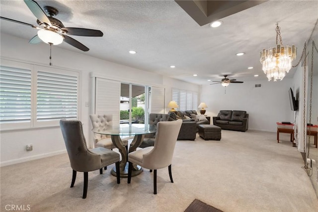 14017 S Wilkie Ave, Gardena, CA 90249 - dining room with a ceiling fan, light carpet, recessed lighting, baseboards, and a chandelier