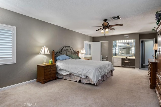 14017 S Wilkie Ave, Gardena, CA 90249 - bedroom featuring light carpet, baseboards, a textured ceiling, and ceiling fan