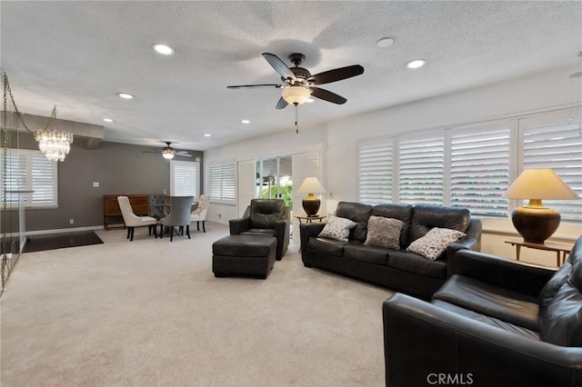 14017 S Wilkie Ave, Gardena, CA 90249 - living area with ceiling fan, recessed lighting, carpet floors, baseboards, and a chandelier