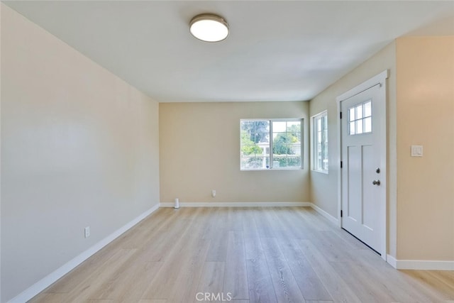 1221 Westminster Ave, East Palo Alto, CA 94303 - foyer entrance featuring light wood-style flooring and baseboards