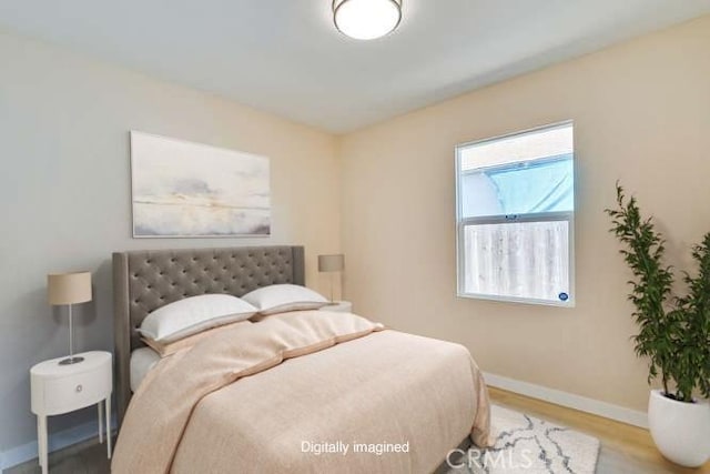 1221 Westminster Ave, East Palo Alto, CA 94303 - bedroom featuring baseboards and wood finished floors