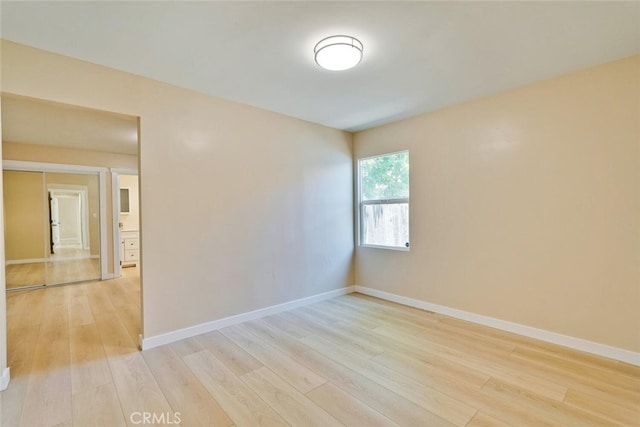 1221 Westminster Ave, East Palo Alto, CA 94303 - unfurnished room with light wood finished floors and baseboards