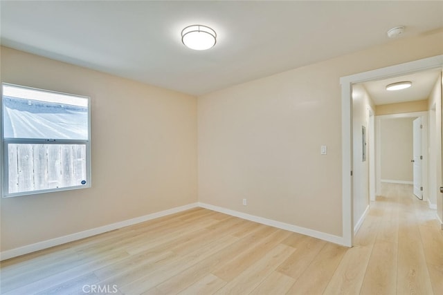 1221 Westminster Ave, East Palo Alto, CA 94303 - empty room featuring light wood-style floors and baseboards