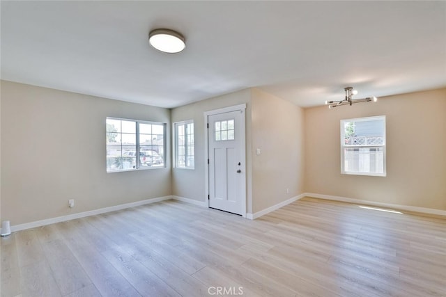 1221 Westminster Ave, East Palo Alto, CA 94303 - foyer entrance with plenty of natural light, light wood-style floors, and baseboards