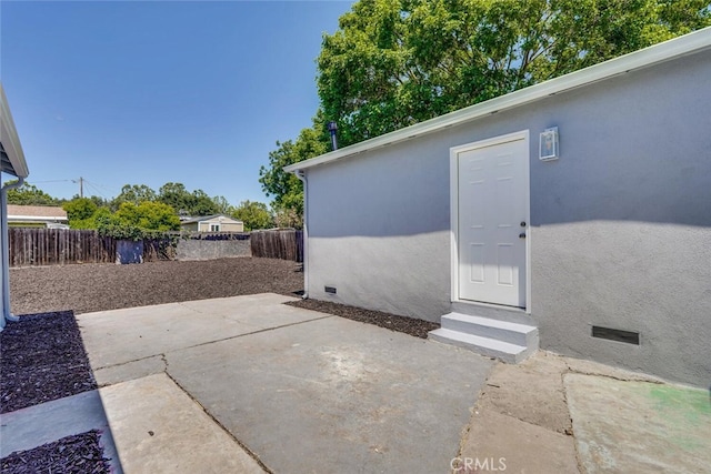 1221 Westminster Ave, East Palo Alto, CA 94303 - fenced backyard with a patio and entry steps