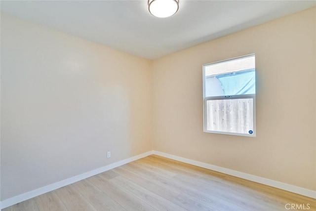 1221 Westminster Ave, East Palo Alto, CA 94303 - spare room with light wood-style flooring and baseboards