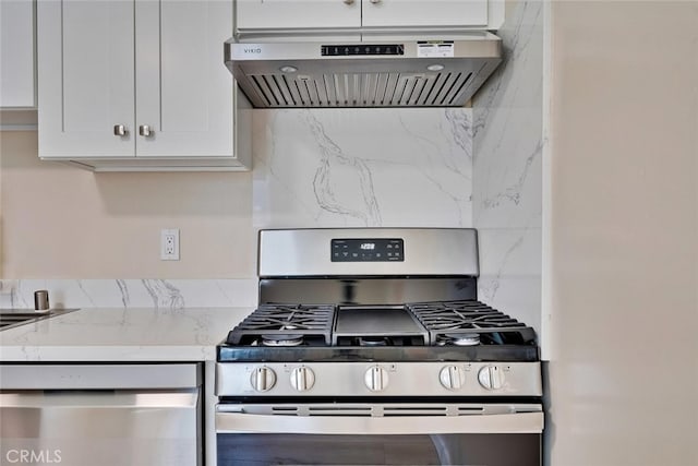 1221 Westminster Ave, East Palo Alto, CA 94303 - kitchen featuring stainless steel appliances, under cabinet range hood, decorative backsplash, light stone countertops, and white cabinets
