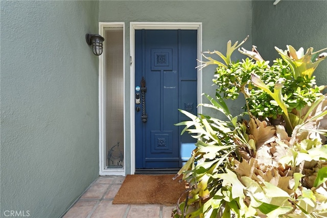 1800 Highland Ave, Manhattan Beach, CA 90266 - doorway to property featuring stucco siding