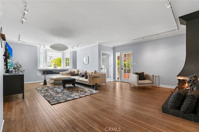 1800 Highland Ave, Manhattan Beach, CA 90266 - living area with track lighting, hardwood / wood-style flooring, and baseboards