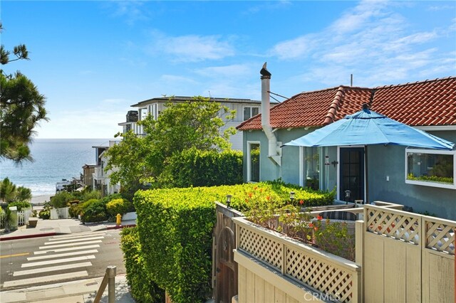 1800 Highland Ave, Manhattan Beach, CA 90266 - exterior space featuring a water view, a tile roof, and stucco siding