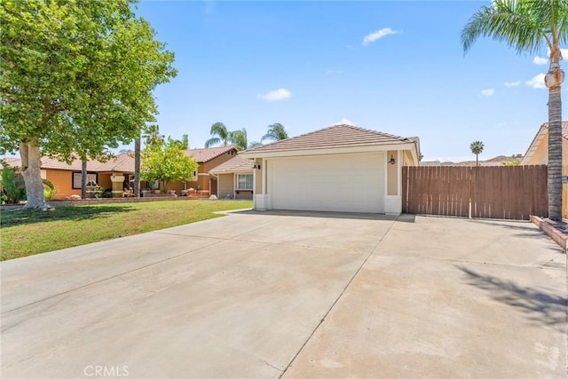 1318 Washington Ave, San Jacinto, CA 92583 - ranch-style house featuring stucco siding, concrete driveway, and a tiled roof