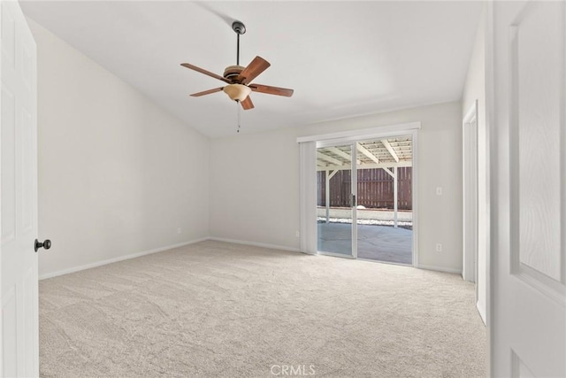 1318 Washington Ave, San Jacinto, CA 92583 - carpeted empty room with a ceiling fan, vaulted ceiling, and baseboards