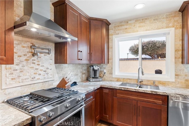 1050 Shelburne Ln, Habra, CA 90631 - kitchen with wall chimney range hood, appliances with stainless steel finishes, a sink, decorative backsplash, and light stone countertops