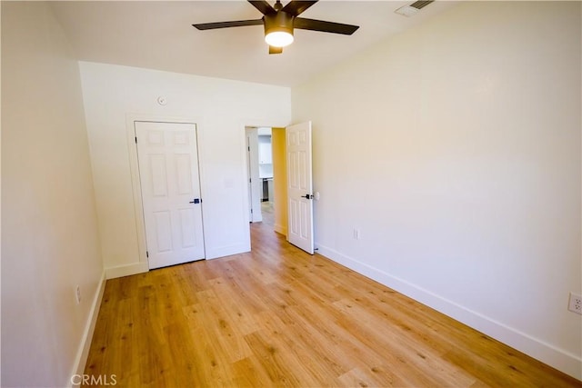 417 S Murdock Ave, Willows, CA 95988 - unfurnished bedroom featuring light wood finished floors, baseboards, and a ceiling fan