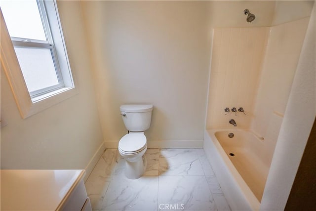417 S Murdock Ave, Willows, CA 95988 - full bath featuring marble look tile flooring, toilet, baseboards, vanity, and tub / shower combination