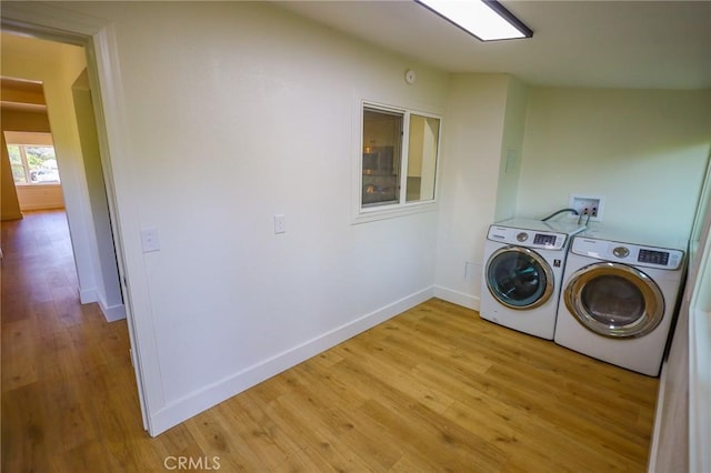 417 S Murdock Ave, Willows, CA 95988 - washroom featuring washer and dryer, baseboards, and light wood-type flooring