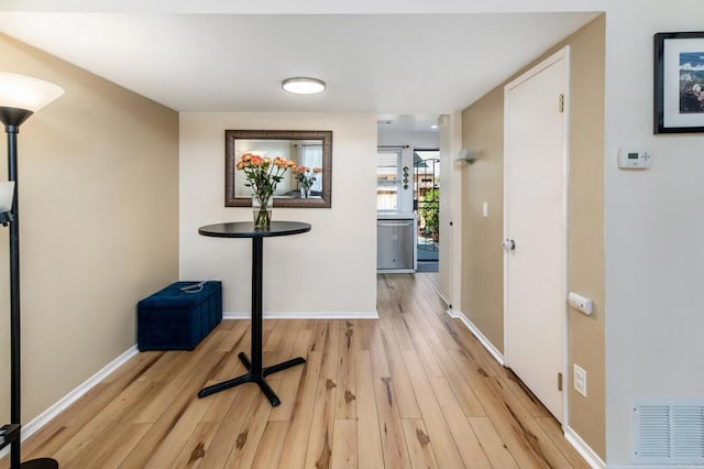 2522 Wanek Rd Unit B, Escondido, CA 92027 - hall featuring light wood-style flooring and baseboards