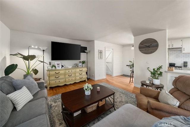 1215 Sylvia Ct, San Luis Obispo, CA 93401 - living room with baseboards and light wood-style flooring