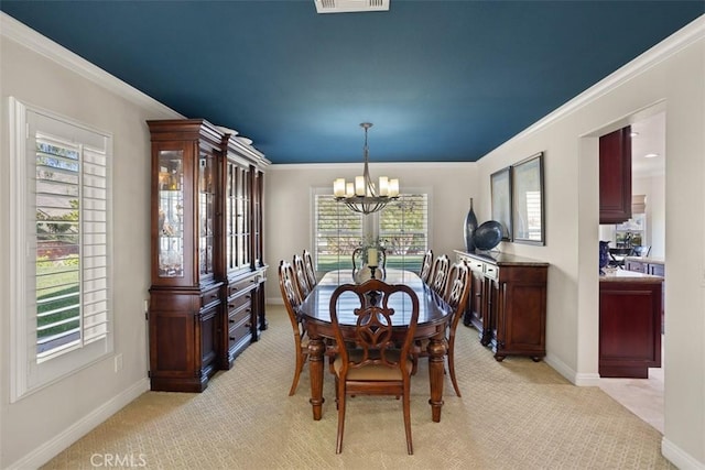 4560 San Antonio Rd, Yorba Linda, CA 92886 - dining space with a chandelier, light colored carpet, baseboards, and ornamental molding