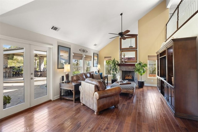 4560 San Antonio Rd, Yorba Linda, CA 92886 - living room with a ceiling fan, high vaulted ceiling, a fireplace, dark wood-type flooring, and french doors