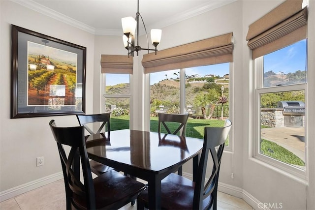 4560 San Antonio Rd, Yorba Linda, CA 92886 - dining space with a chandelier, light tile patterned flooring, baseboards, and crown molding