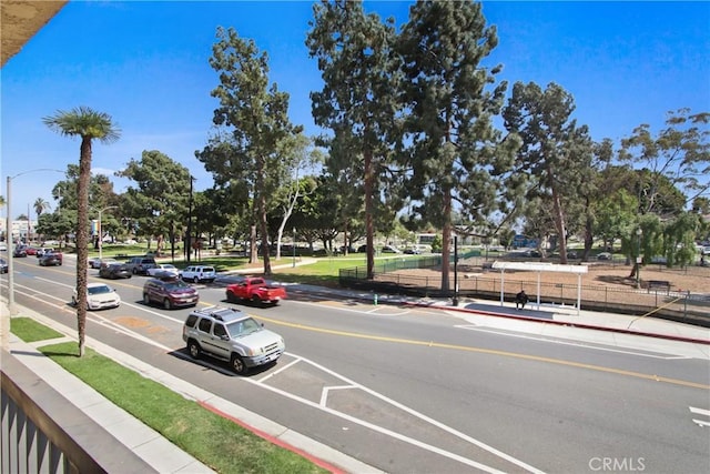 2015 E Broadway Unit 204, Long Beach, CA 90803 - view of asphalt road with sidewalks, curbs, and street lights