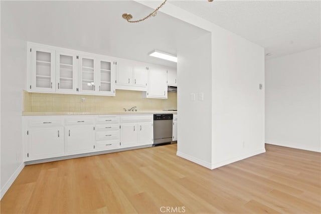 2015 E Broadway Unit 204, Long Beach, CA 90803 - kitchen with dishwasher, light wood-type flooring, light countertops, white cabinetry, and glass insert cabinets