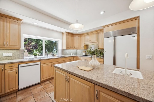 993 Las Palmas Way, San Luis Obispo, CA 93401 - kitchen with white dishwasher, built in refrigerator, a sink, light brown cabinetry, and recessed lighting