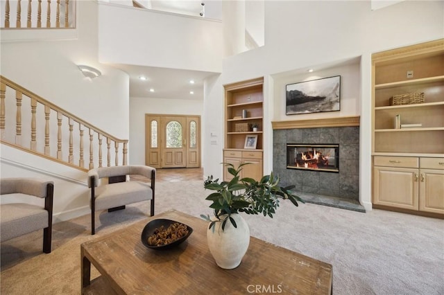 993 Las Palmas Way, San Luis Obispo, CA 93401 - living area featuring carpet, a high ceiling, built in features, a fireplace, and recessed lighting