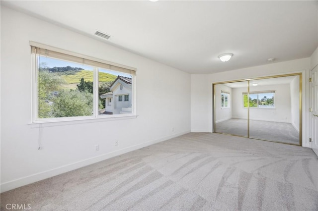 993 Las Palmas Way, San Luis Obispo, CA 93401 - unfurnished bedroom with carpet floors, baseboards, and a closet