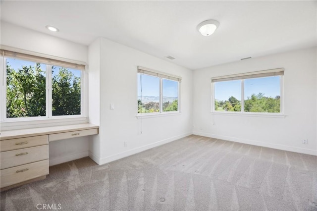 993 Las Palmas Way, San Luis Obispo, CA 93401 - unfurnished bedroom featuring baseboards and light carpet