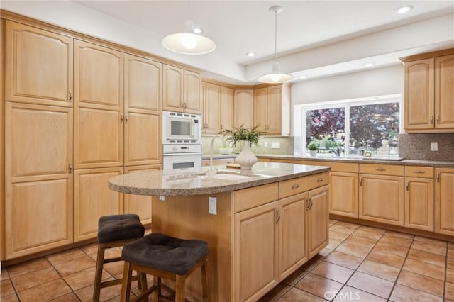 993 Las Palmas Way, San Luis Obispo, CA 93401 - kitchen with light brown cabinets, white appliances, light tile patterned floors, and recessed lighting