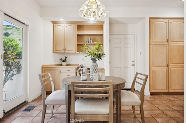 993 Las Palmas Way, San Luis Obispo, CA 93401 - dining space with a chandelier and light tile patterned floors