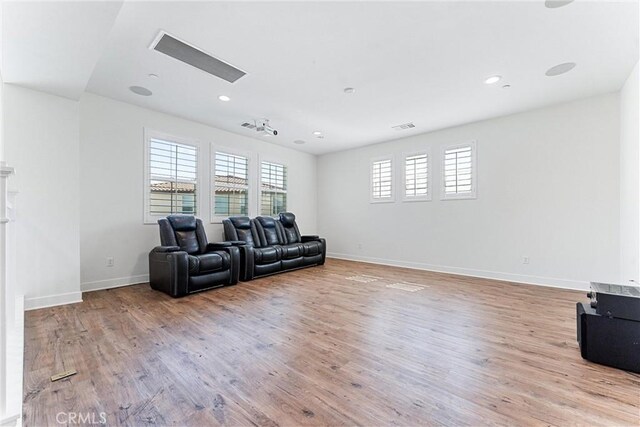 17150 Vita Way, Riverside, CA 92503 - living area with light wood finished floors, baseboards, and recessed lighting