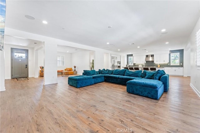 17150 Vita Way, Riverside, CA 92503 - living area featuring recessed lighting, light wood-style flooring, and baseboards