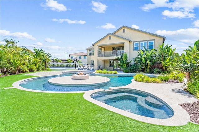 17150 Vita Way, Riverside, CA 92503 - view of pool featuring a lawn, a patio area, and a pool with connected hot tub
