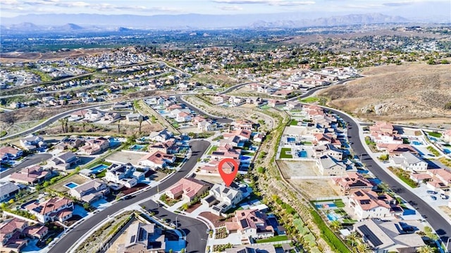 17150 Vita Way, Riverside, CA 92503 - aerial overview of property's location featuring a mountain backdrop and nearby suburban area