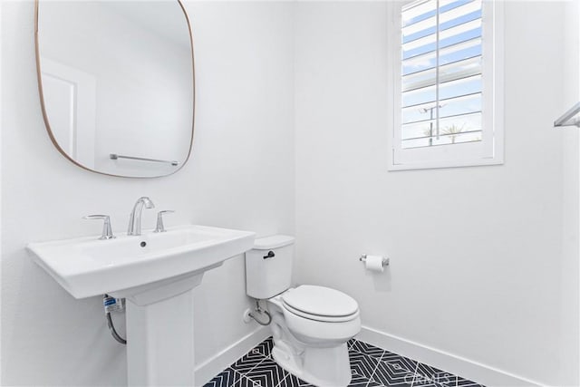 17150 Vita Way, Riverside, CA 92503 - bathroom featuring baseboards, toilet, and tile patterned floors
