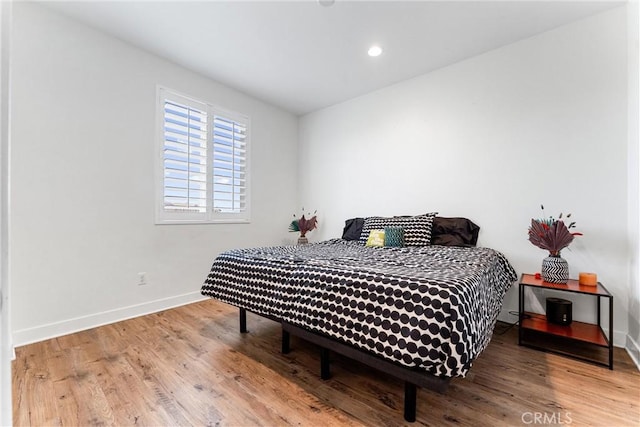 17150 Vita Way, Riverside, CA 92503 - bedroom with baseboards, wood finished floors, and recessed lighting